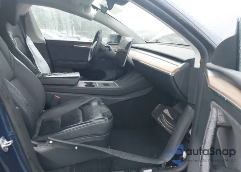 2023 Tesla Model Y from USA, damaged, VIN 7SAYGDEFXPF941604